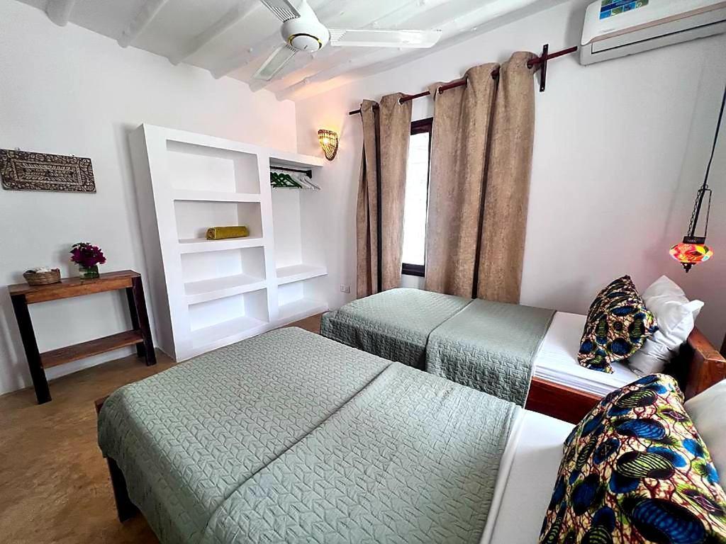 Moyo Apartment Pwani Mchangani Buitenkant foto